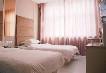 Sitong Business Hostel Qing Zhou 外观 照片